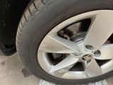 a close up of a tire on a car ' s rim