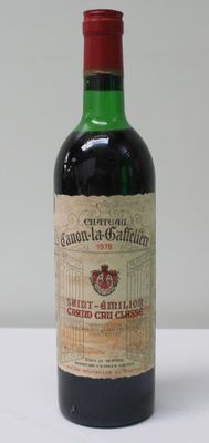 a bottle of wine that is sitting on a table