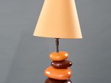 an image of a table lamp with a brown shade on top of it
