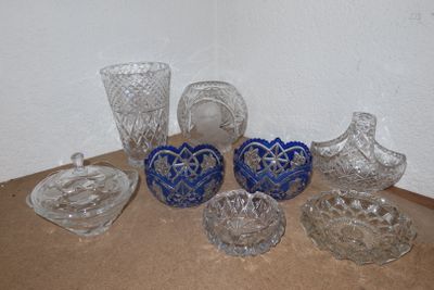 a lot of glass items sitting on a table
