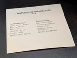 a piece of paper on a table with a price list on it