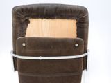 a brown chair with a wooden seat and a metal frame