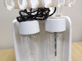two water bottles that are sitting on a table
