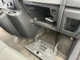the interior of a car with the center console and console panel removed