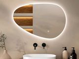 a bathroom with a sink and a mirror on the wall