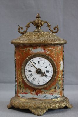 Penduelette en bronze et tôle peinte à décor d'enfants dans …