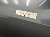 a close up of a sticker on the hood of a car