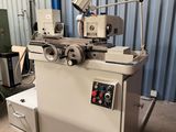 an image of a machine that is sitting in a garage