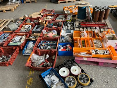 many boxes of assorted items sitting on the floor
