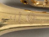 a close up of a brass instrument on a table