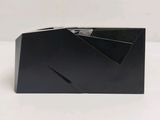 an empty black box sitting on top of a white table