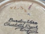 a close up of a coffee cup with writing on it