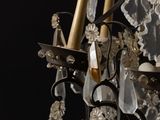 a chandelier that has a lot of crystals hanging from it