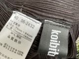 a close up of a ball of yarn with a price tag on it