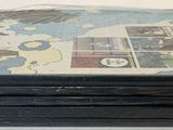 a lot of books that are stacked on top of each other