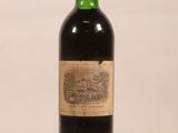 a bottle of wine that is sitting on a table