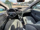 the interior of a car with a dashboard and a steering wheel