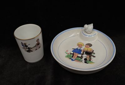 a cup and saucer sitting next to each other on a table