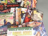 a lot of comic books that are on the table