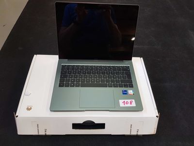 a laptop that is sitting on top of a box