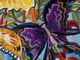a painting of a butterfly and flowers on the wall