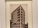 an old picture of a building and a picture of a building