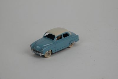 a toy car that is sitting on a white surface