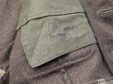a close up of a jacket with a patch on it