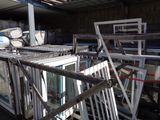 a large amount of windows and doors in a warehouse