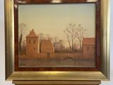 painting on easel with a painting of a house in the background