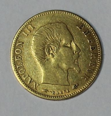 an image of a gold coin with a man ' s face on it