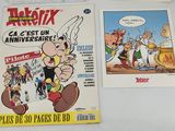 two comics are sitting on a table next to each other