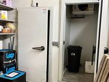 an image of a kitchen with a lot of clutter on the floor