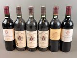 six bottles of wine are lined up in a row