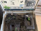 a box with tools in it sitting on the floor