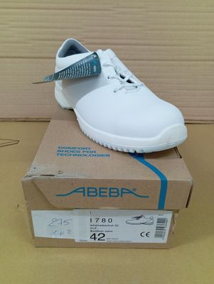 a box with a pair of shoes on top of it