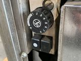 a close up of a machine that is sitting on a pallet