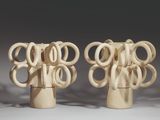 two vases that are shaped like a tree