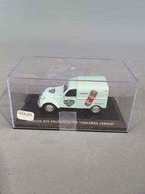 a small toy truck in a clear box