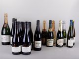 a group of bottles of wine sitting on top of a table
