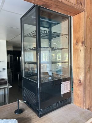 an image of a glass display case in a kitchen