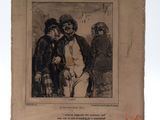 un vieux livre sur lequel figure le dessin d'un homme et d'une femme