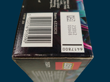 a close up of a box of toothbrushes on a blue background