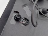 a pair of headphones sitting on top of a box