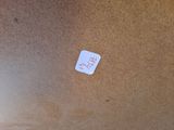 a sticker that is on the floor of a room