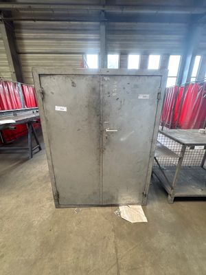 an image of a metal cabinet in a warehouse
