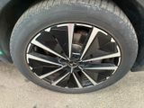 a close up of a tire on a car ' s rim