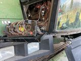 an image of a truck with a bunch of wires on the front of it