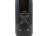 a bottle of wine that is sitting on a table