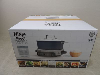 the box of the ninja food cooker is open and ready to be used